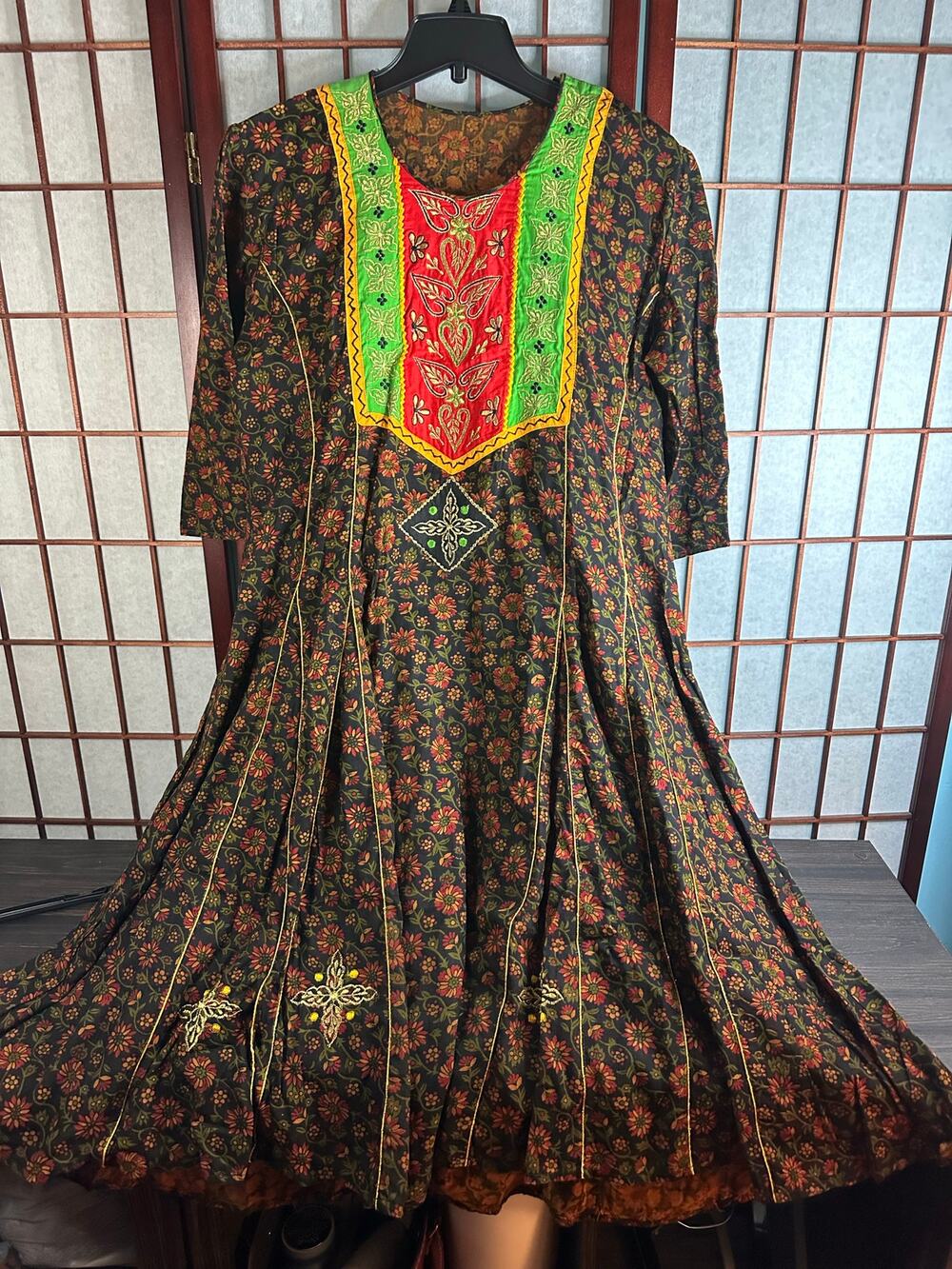 South Asian Anarkali dress or kurta with floral pattern and colorful embroidery